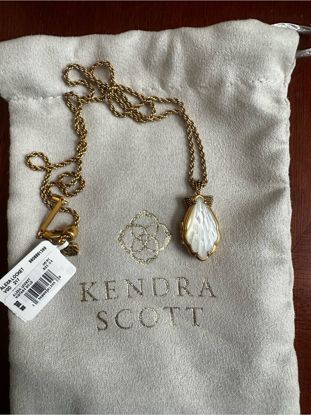 Kendra Scott Gold-Tone Mother of Pearl Shell Locket Necklace - Picture 3 of 7